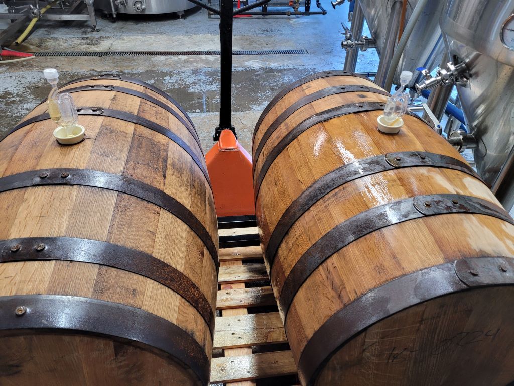 Two barrels of beer in a brewery